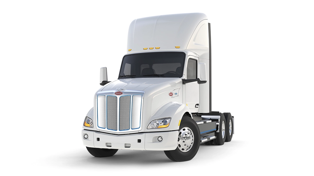 Peterbilt Model 579EV Electric White Truck Isolated - Feature Image
